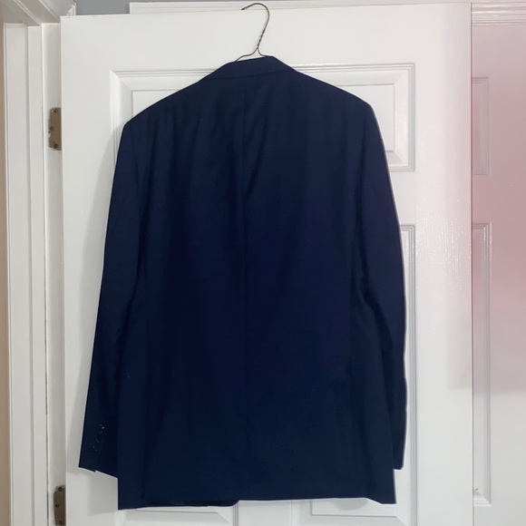 Includes both suit jacket and pants. The brand is Calvin Klein - Picture 2 of 4